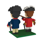 The Revolutionary War Soldiers Mini Blocks set includes two blocky figures on a green base, dressed in colonial uniforms—one in blue and beige, the other in red and white with a musket. Both wear black hats with white trim.