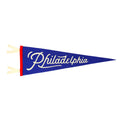 The Philadelphia Pennant is a blue wool felt flag with red trim, white ties, and "Philadelphia" in white cursive.