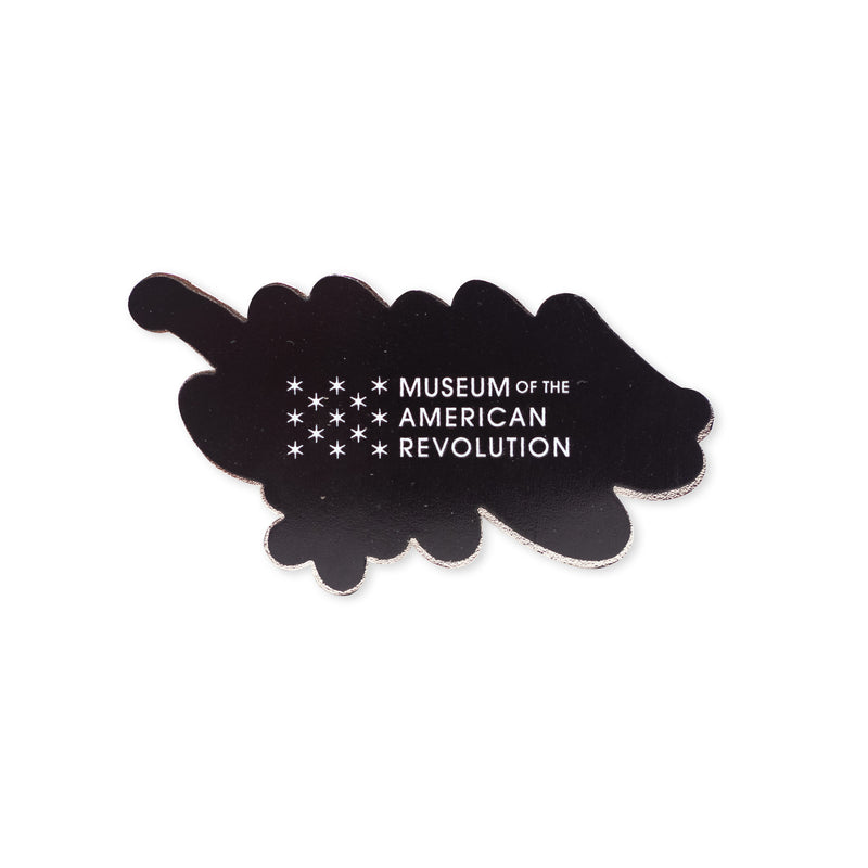 The 1776 Magnet is a black cloud-shaped magnet featuring white stars and "Museum of the American Revolution" text—a stylish tribute to American independence.