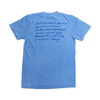 Introducing the “We Hold These Truths 1776 T-Shirt” in washed denim, featuring script from the Declaration of Independence on the back in blue font, with “July 4, 1776” highlighted in red. Laid flat to showcase its prominent text, this shirt is perfect for anyone who appreciates American history.
