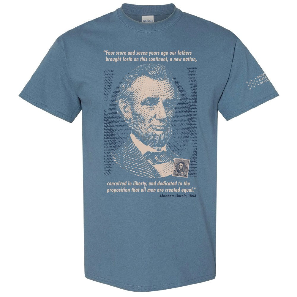 Abraham Lincoln T-Shirt in blue features a bold portrait, the Gettysburg Address as a quote, and the Museum's logo on the right sleeve.