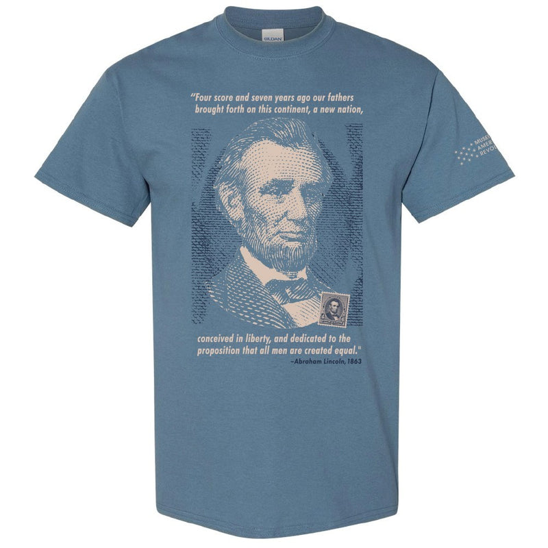 Abraham Lincoln T-Shirt in blue features a bold portrait, the Gettysburg Address as a quote, and the Museum's logo on the right sleeve.