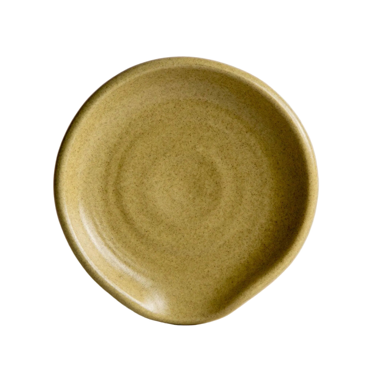A round, light brown Handcrafted Stoneware Spoon Rest with an uneven, slightly wavy rim and a small dip on one side, offering an organic, artisanal look—perfect for adding charm and effortless organization to your kitchen. Handmade in the USA.