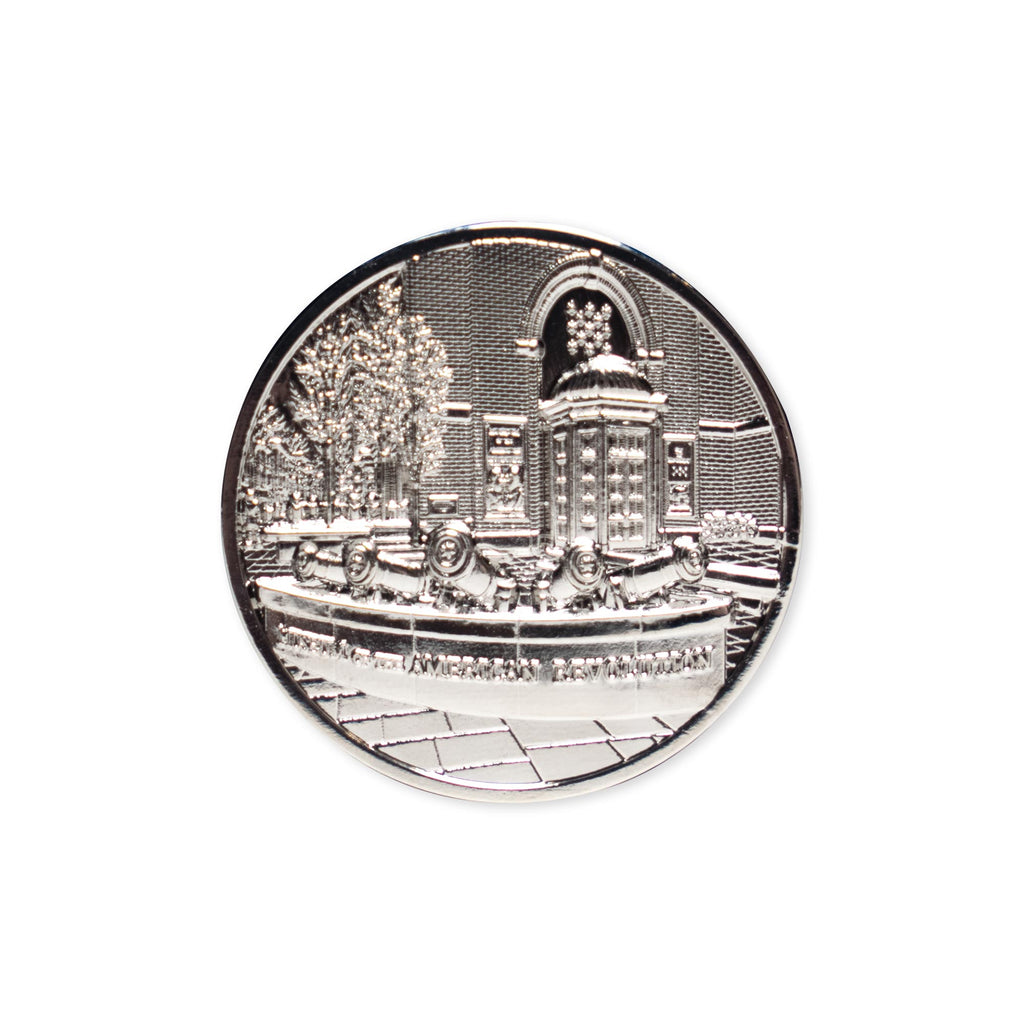 The Challenge Coin features an embossed fountain with lion statues, a brick building, trees, and the words "AMERICAN BANK CENTER" at the bottom—making it a unique collectible for any coin collection.