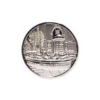 The Challenge Coin features an embossed fountain with lion statues, a brick building, trees, and the words "AMERICAN BANK CENTER" at the bottom—making it a unique collectible for any coin collection.