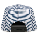 A close-up of the back of the Strped Camper Hat, Baby/Toddler, featuring blue and white cotton stripes and an adjustable black plastic snapback closure.