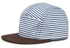 The Strped Camper Hat, Baby/Toddler is a five-panel cotton hat for kids, featuring blue and white horizontal stripes and a flat dark brown brim, shown from the side. This stylish camper hat offers an adjustable snapback to ensure the perfect fit.