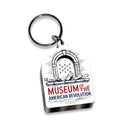 The Museum Keychain, Wood features an arched window design with cannons, stars, and red & blue Museum of the Revolution text. 