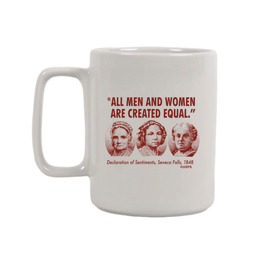 Raise a toast to history with the Seneca Falls Mug, featuring bold red text “ALL MEN AND WOMEN ARE CREATED EQUAL,” portraits, and “Declaration of Sentiments, Seneca Falls, 1848, USPS” — honoring the women’s rights movement.