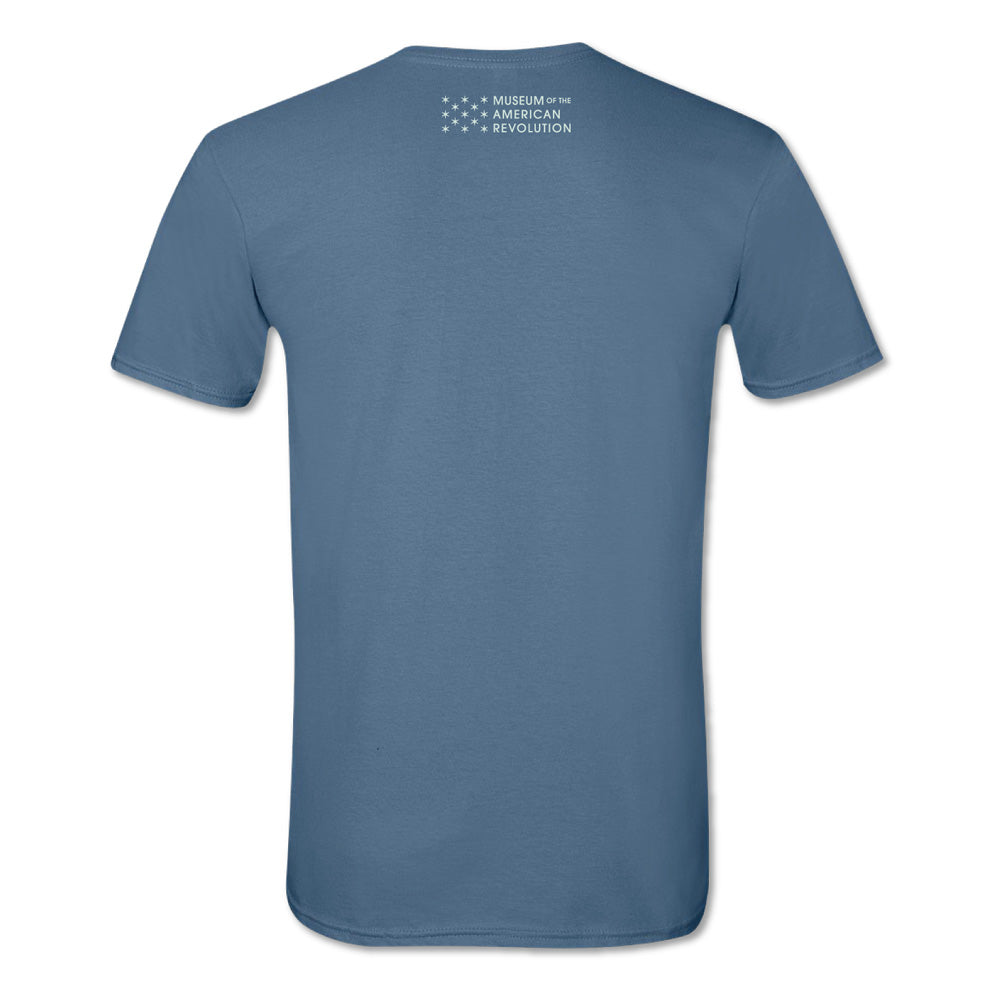 The Well-Behaved Women T-Shirt is a blue short-sleeve tee shown from the back, featuring a small white Museum of the American Revolution logo with a star design near the neckline.