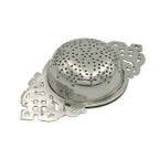 The Nickel Plated Tea Strainer features vintage styling, a domed perforated center, and ornate decorative handles — ideal for brewing loose-leaf tea. Shown against a white background.