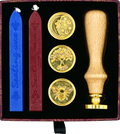 The Sealing Wax Stamp Kit includes two blue and two red wax sticks, three gold brass stamps (moon, tree, bee designs), and a wooden handle—everything needed for creating beautiful wax seals.