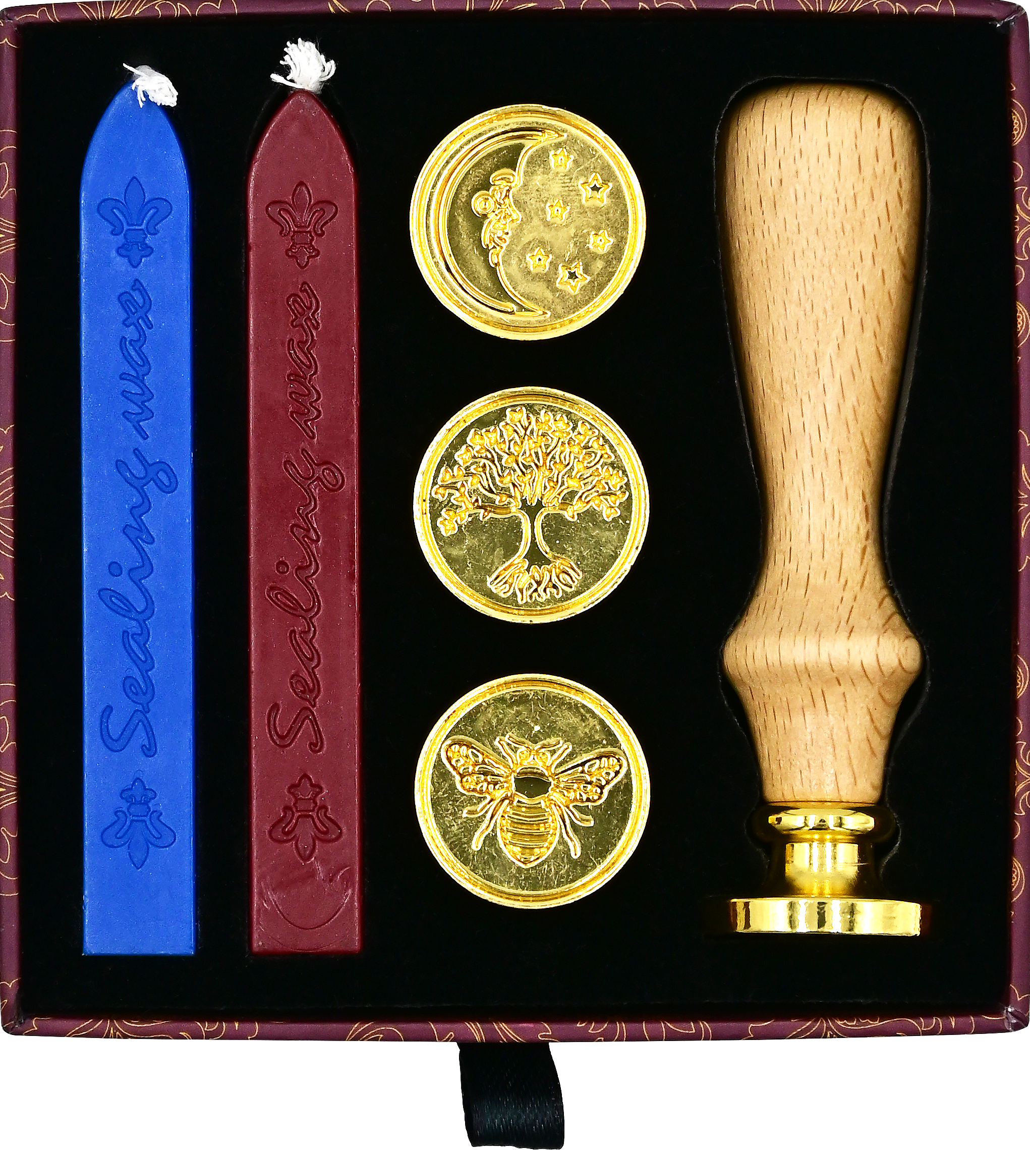 The Sealing Wax Stamp Kit includes two blue and two red wax sticks, three gold brass stamps (moon, tree, bee designs), and a wooden handle—everything needed for creating beautiful wax seals.