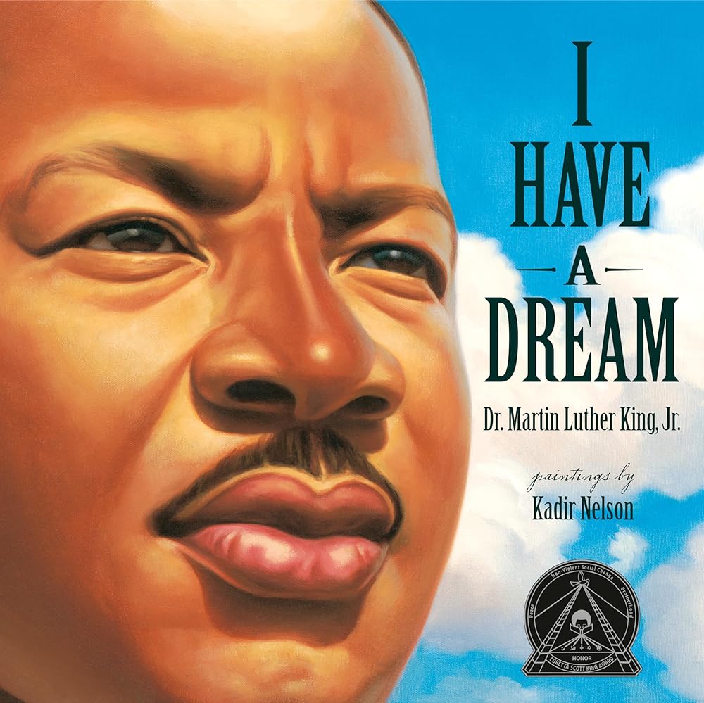 Book cover of 'I Have a Dream' by Dr. Martin Luther King Jr. with a close-up of his face and a blue sky background.