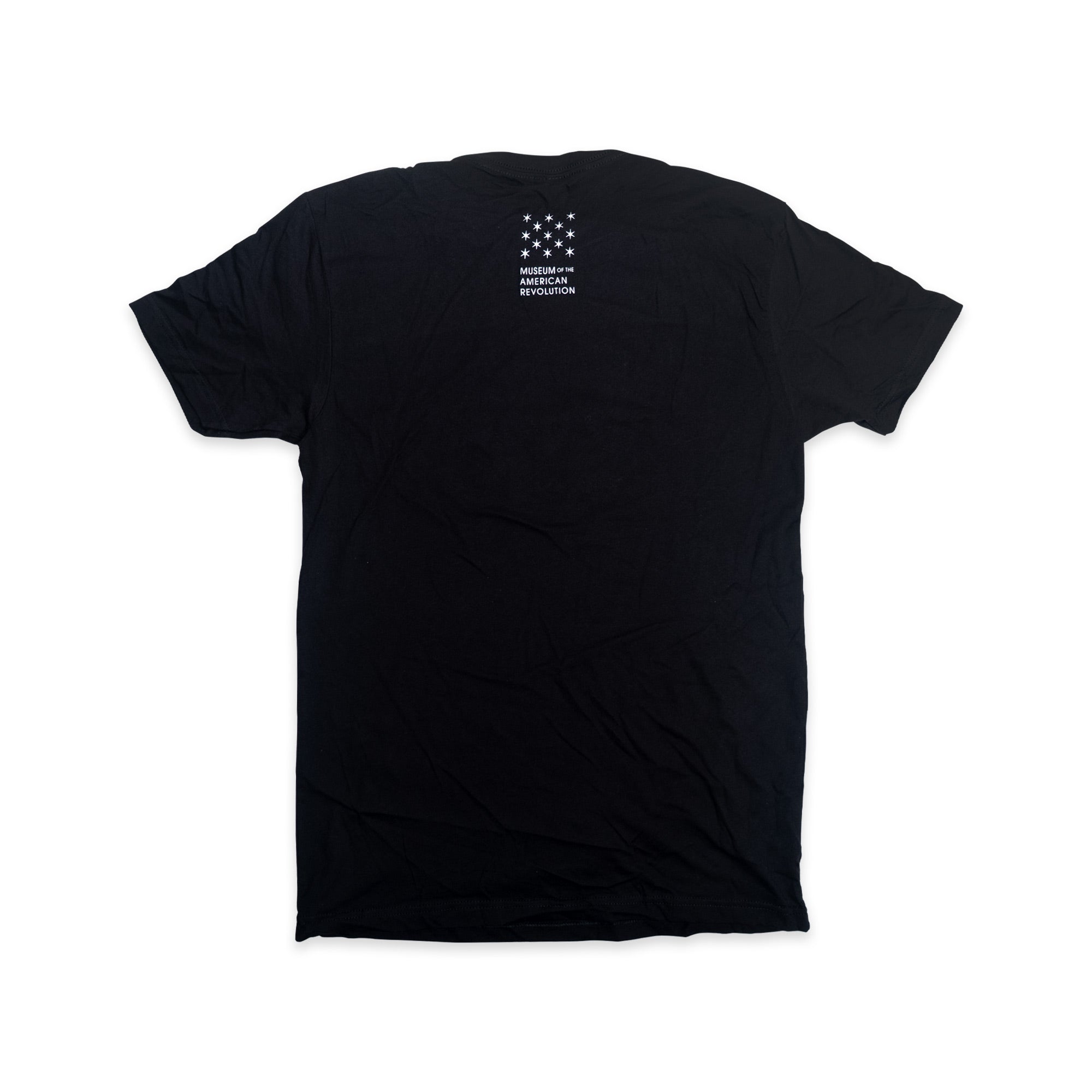 The Created Equal T-Shirt is shown laid flat, back side up, featuring small white text and a pattern of stars near the top center. This patriotic t-shirt subtly nods to American heritage and is displayed against a plain white background.