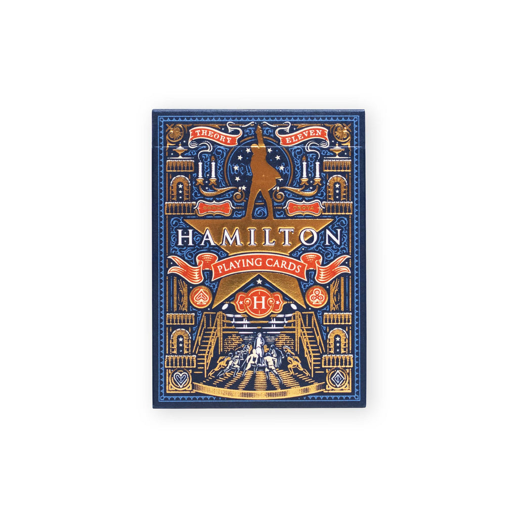 Hamilton Playing Cards—a box of premium Broadway musical merchandise—features an ornate gold, blue, and red decorative design with a striking silhouette and “Hamilton Playing Cards” text on the front, making it a must-have collectible for any fan.