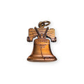The Liberty Bell Pendant is an antique bronze charm featuring a visible crack and a loop at the top for easy attachment to a necklace or keychain, making it the perfect Philadelphia souvenir. The pendant is shown isolated on a white background.