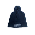 Museum Beanie in navy blue knit with a white embroidered Museum of the American Revolution logo featuring thirteen stars on the folded cuff.