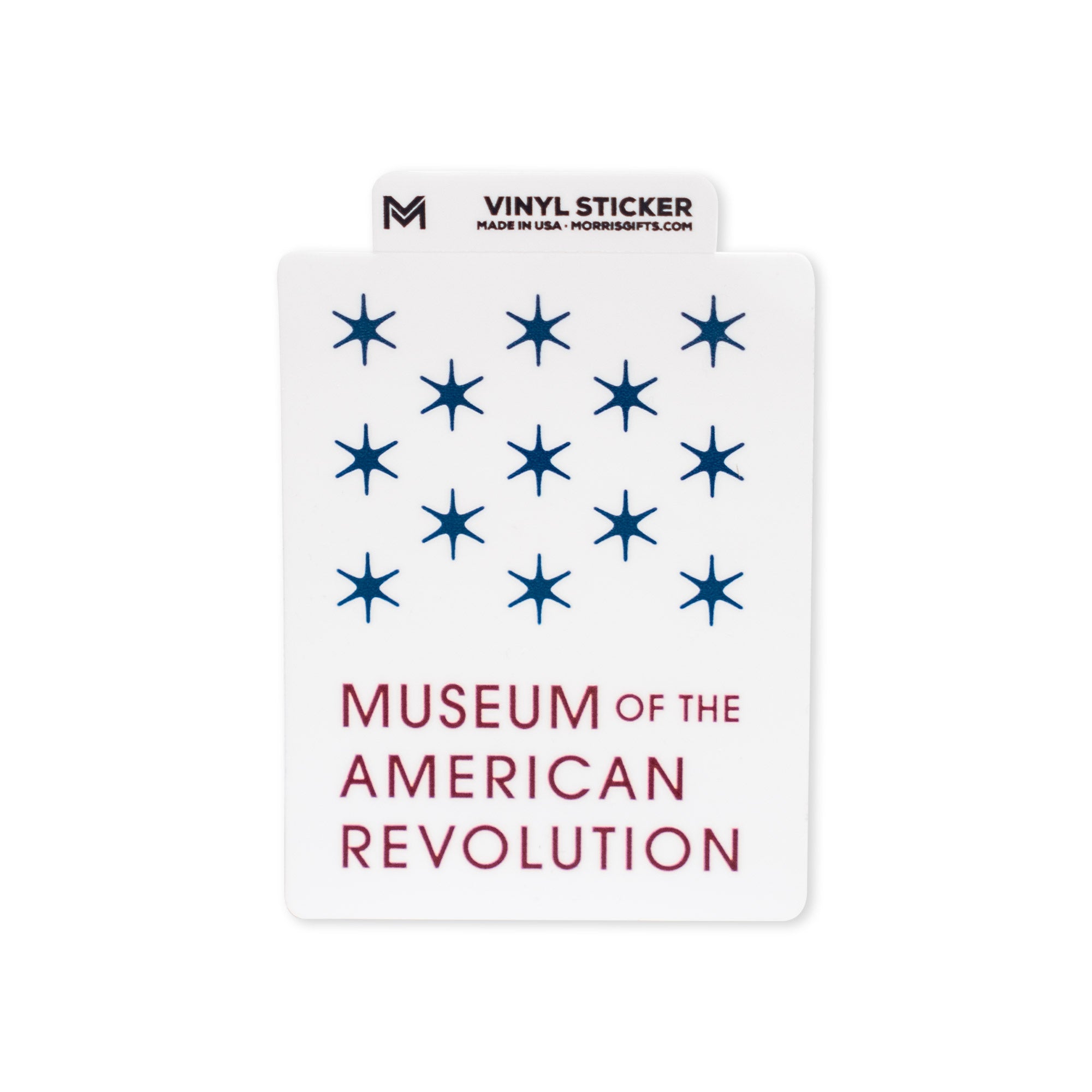 Rectangular, weather-resistant Museum Logo Vinyl Sticker featuring thirteen blue stars and the words “Museum of the American Revolution” in bold blue and red text. A top tab reads: “Vinyl Sticker. Made in USA. MORSBOTS.COM.” This sticker is perfect for history enthusiasts looking to show off their passion for American history.
