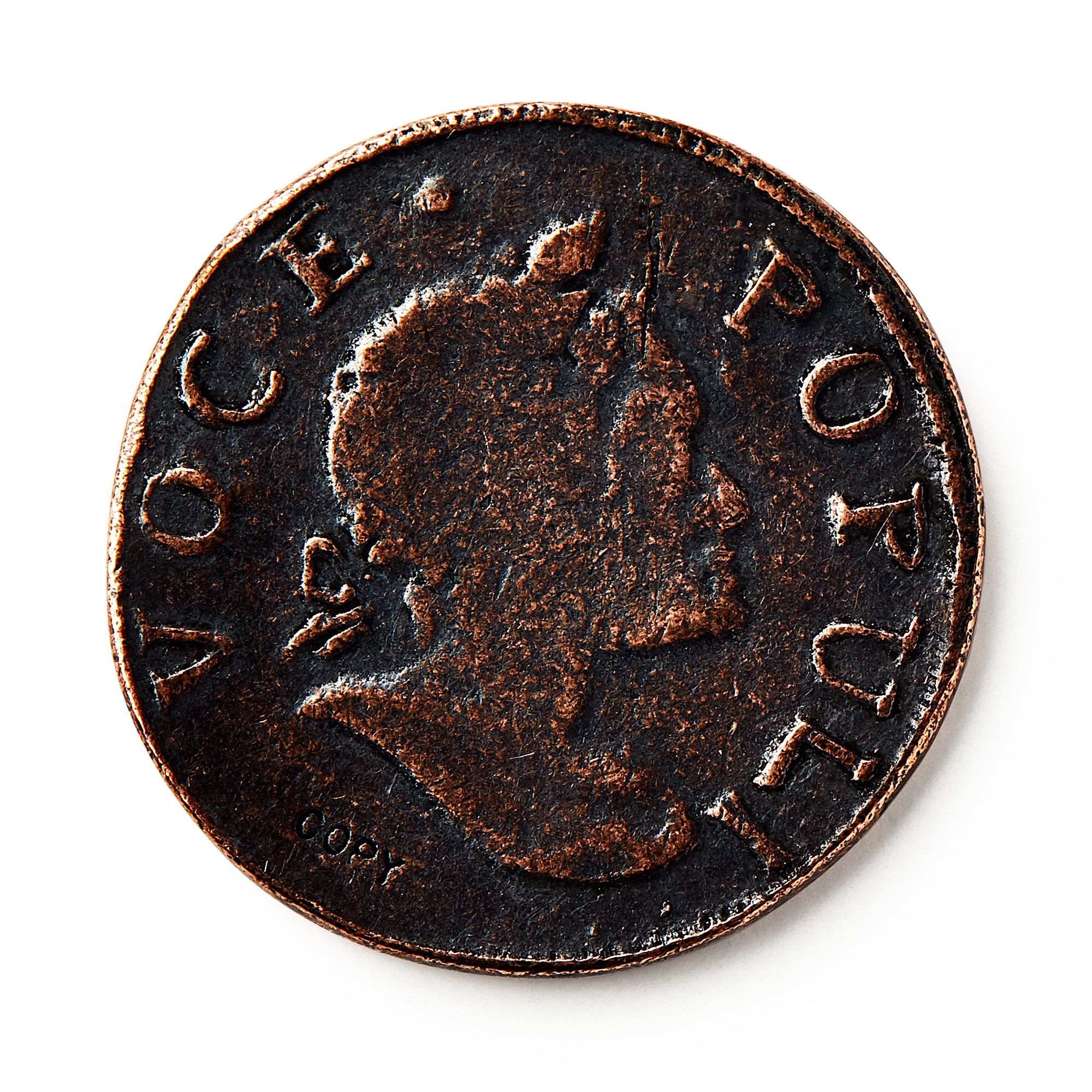 A close-up of the 1760 Voce Populi Halfpenny, a colonial token with a right-facing profile and "VOCE POPULI" inscribed around the edge. The coin features a dark patina and textured surface.