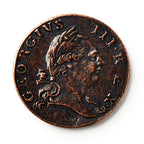 A close-up of a 1773 Virginia Halfpenny, an old British colonial coin showing a right-facing man with a laurel crown. The edge reads GEORGIUS III. REX, with COPY marked at the bottom of this historic currency.