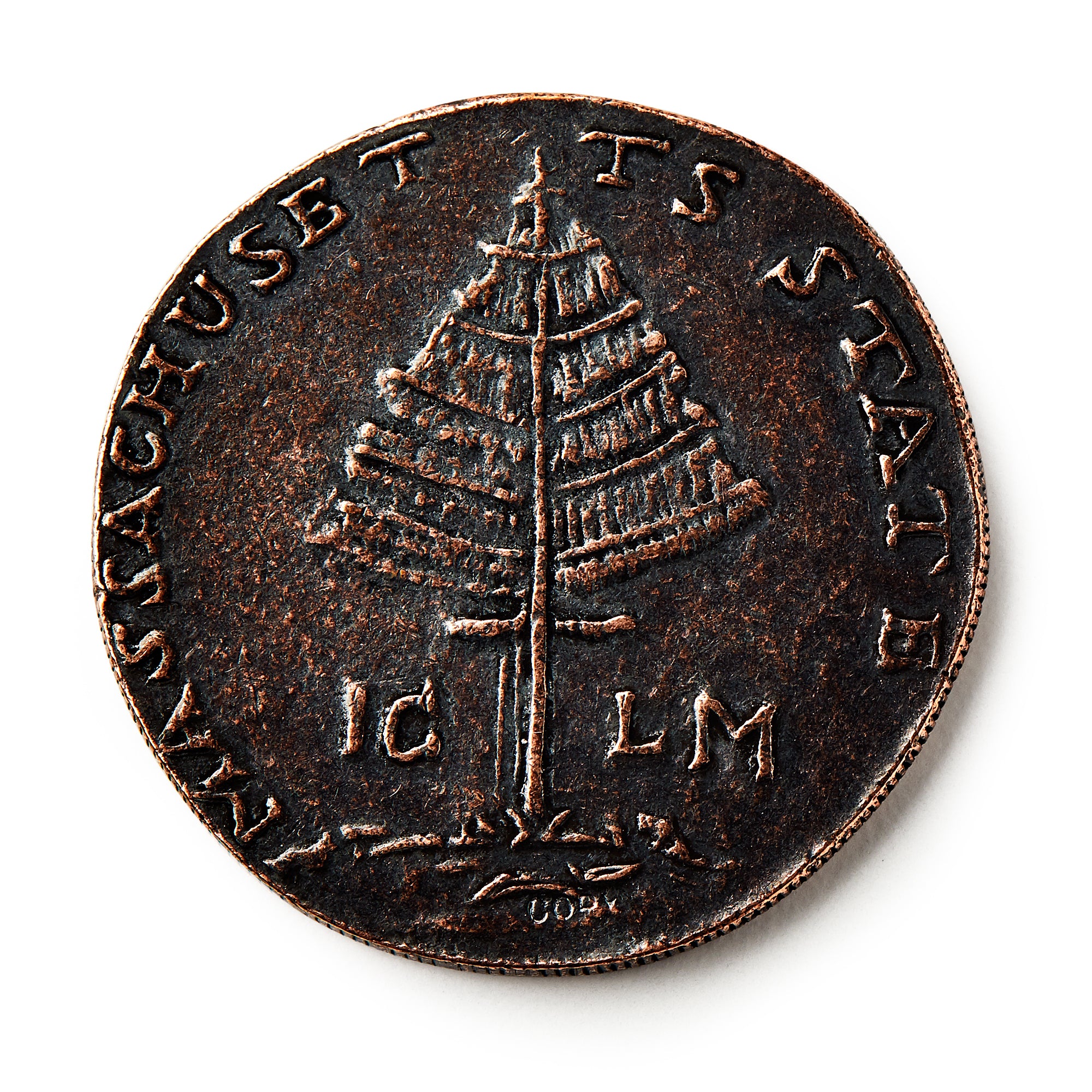 The 1776 Pine Tree Copper Coin features a detailed pine tree at its center, with MASSACHUSETTS and STATE inscribed along the edge—an iconic piece of early American currency representing colonial independence.