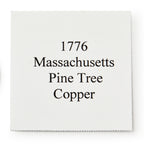 A white square paper with black text that reads: 1776 Pine Tree Copper Coin, a symbol of colonial independence and early American currency.