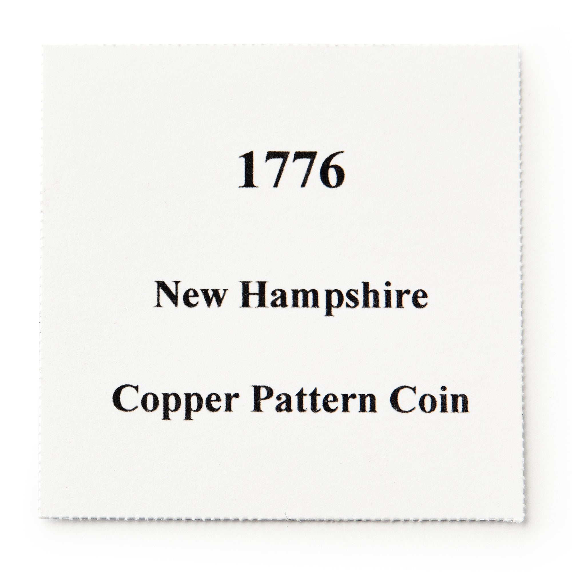 A square white card with black text displaying the 1776 New Hampshire Halfpenny, an early American colonial coin.