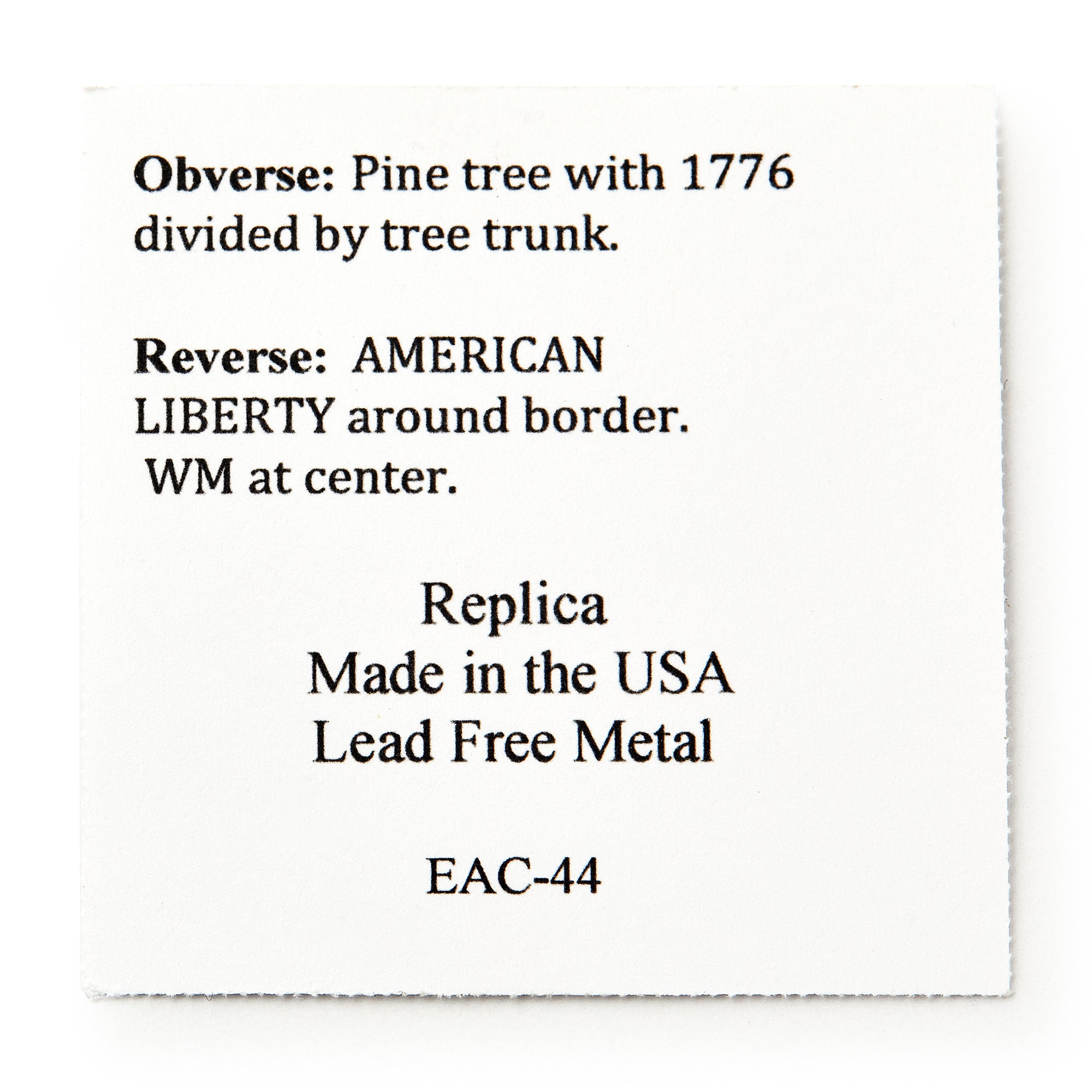 A white square card describes the 1776 New Hampshire Halfpenny replica: obverse shows a pine tree with 1776 split by the trunk; reverse reads AMERICAN LIBERTY and WM at center. Made in the USA from lead-free metal.