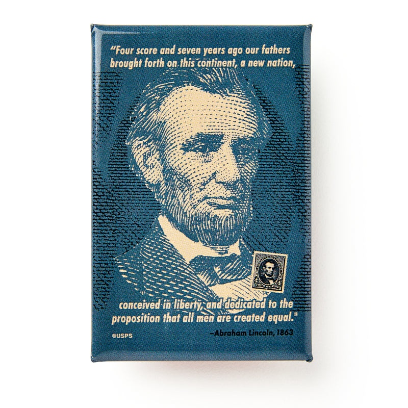 A printed image of Abraham Lincoln and his postage stamp are featured on the Abraham Lincoln Magnet, with yellow Gettysburg Address text on blue—making this a unique history gift that celebrates American democracy.