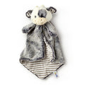 The Cuddler Cow Plush is a soft security blanket for babies, featuring gray and white fur, small horns, stitched facial features, a striped gray and white underside, and a "Bub" tag—an ideal nursery gift.