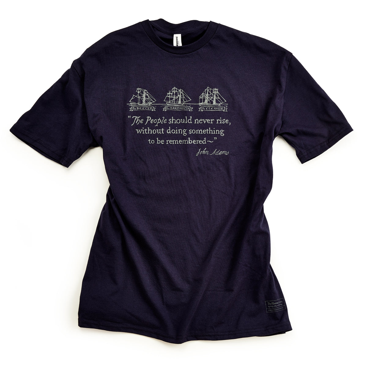 Dark blue Boston Tea Party Ships T-Shirt featuring a graphic of the ships Beaver, Dartmouth, and Eleanor, above a quote by John Adams commemorating the 250th anniversary of American independence.