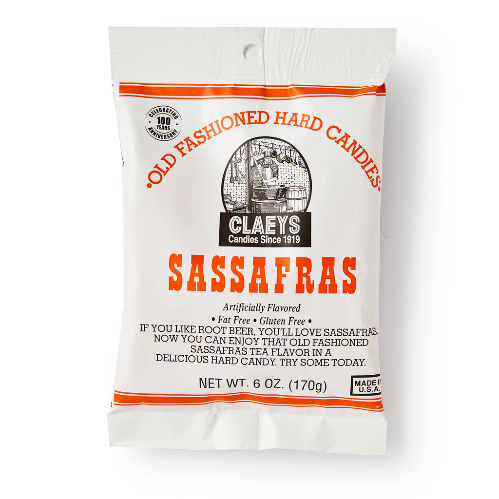 A white bag of Sassafras Old Fashioned Hard Candies, with red and black text and a nostalgic candy maker image. This 6 oz (170g) bag is fat-free, gluten-free, and ideal for those who love classic flavors.