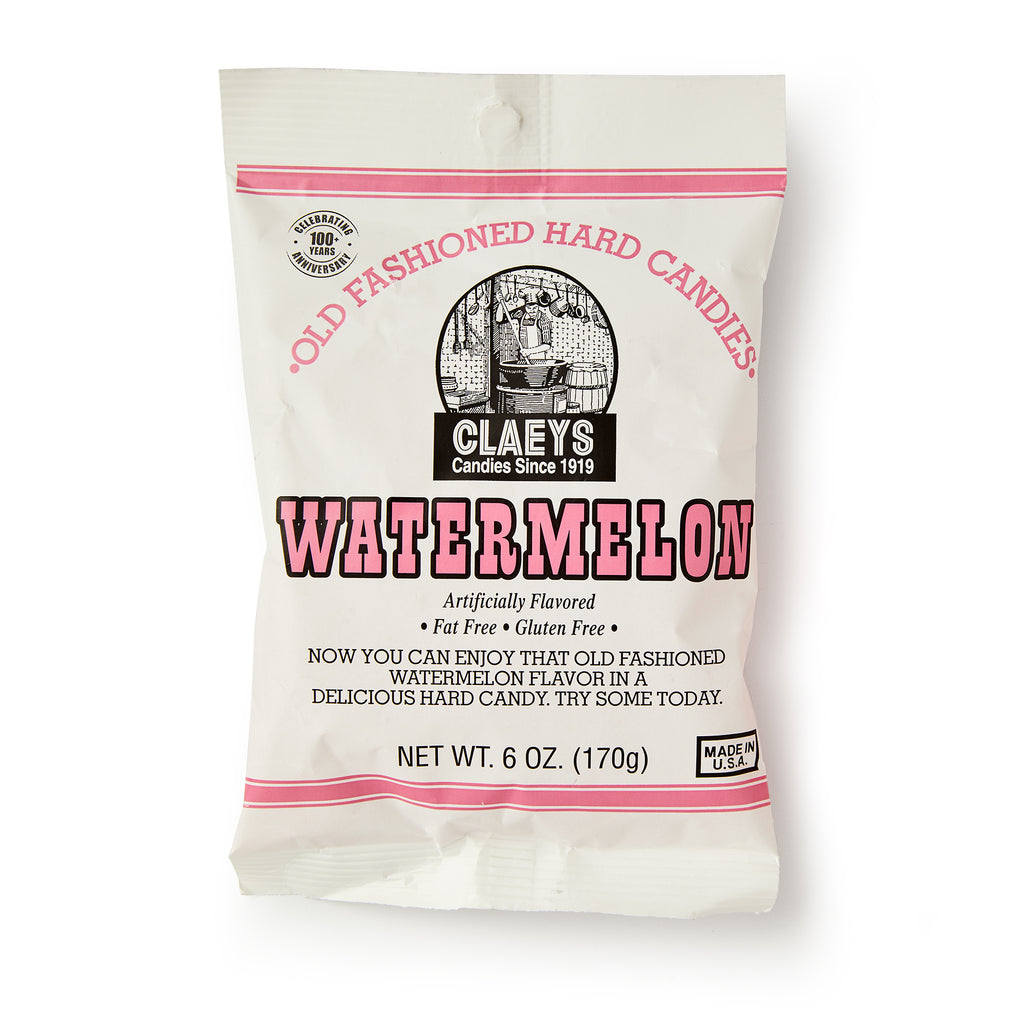 A 6 oz white bag of Watermelon Old Fashioned Hard Candies features pink and black text, a vintage illustration, and highlights Fat Free, Gluten Free, Made in USA. Enjoy these classic watermelon-flavored hard candies!.