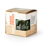 A Green Deck Prism, Small, peeks out from a brown box labeled “Deck Prism” and “Charles W. Morgan,” celebrating maritime heritage with a brief history printed on the side.