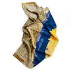 The Historic Philadelphia Then Scarf is a silk accessory featuring a beige historic map and blue-yellow skyline silhouettes along one edge, shown against a white background.