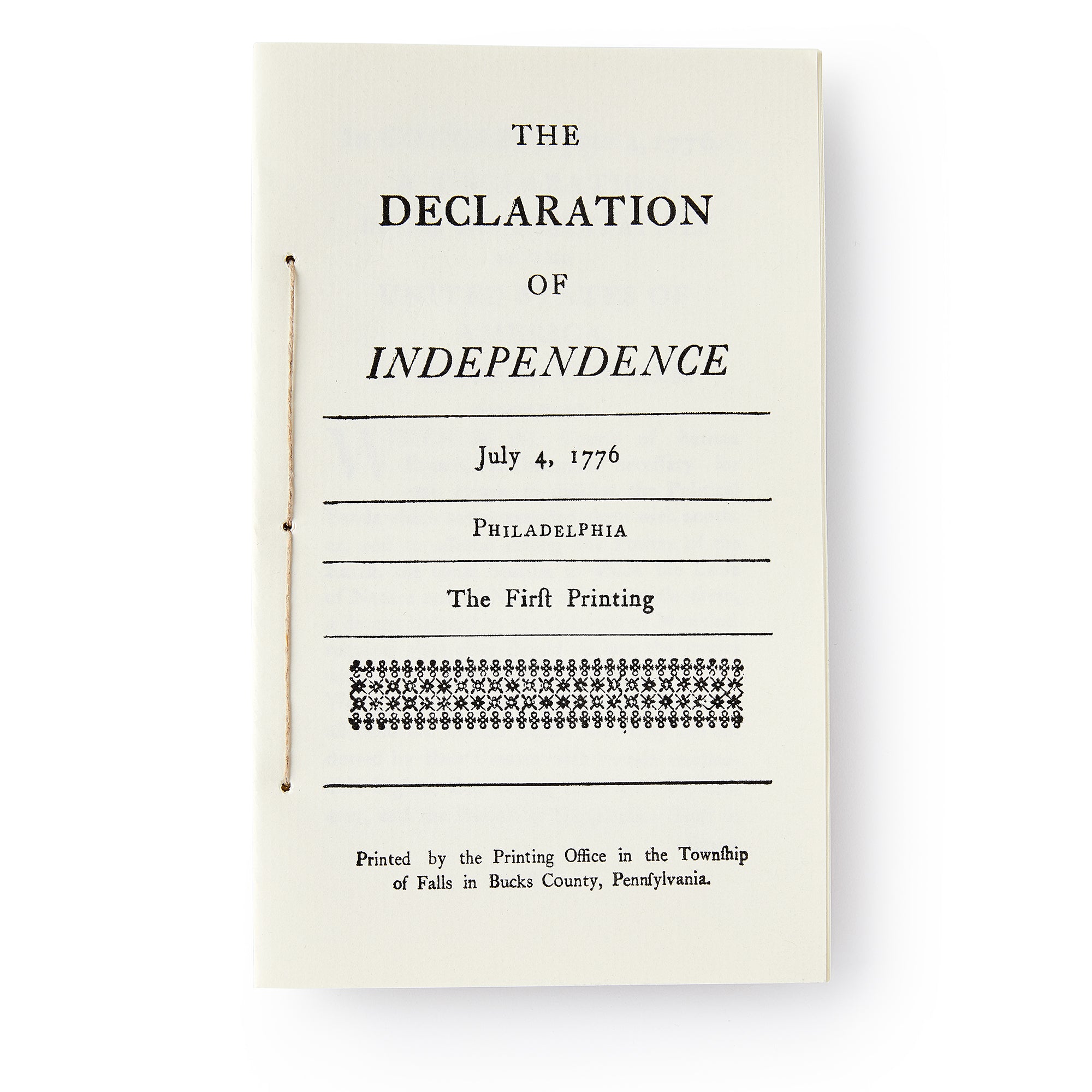 The Declaration of Independence Pamphlet features a hand-stitched cover reading, “The Declaration of Independence, July 4, 1776, Philadelphia, The First Printing,” plus a decorative line and a note on the Bucks County, PA printing office.