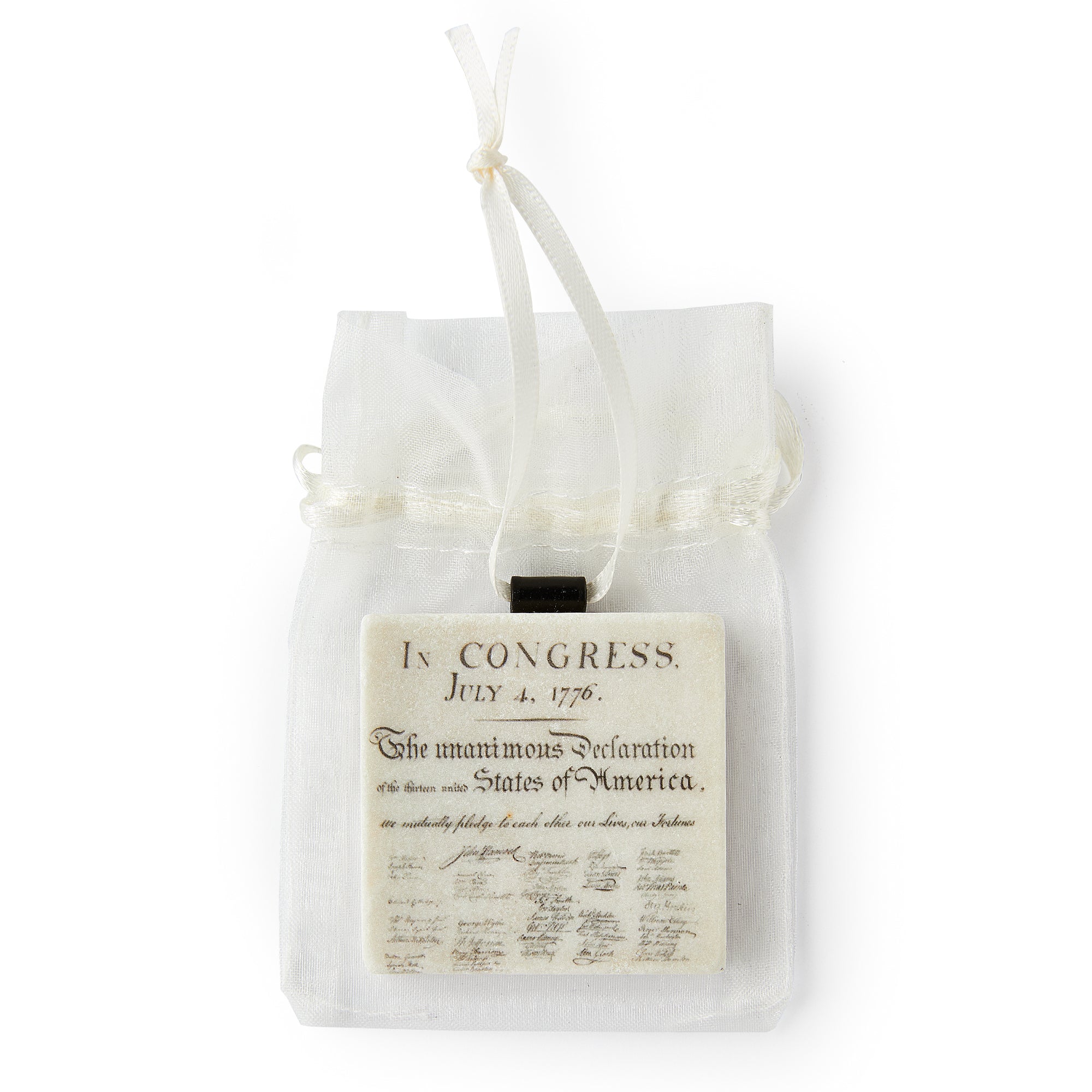 The Declaration of Independence Ornament is a small printed replica presented in a sheer white organza drawstring bag with ribbon.