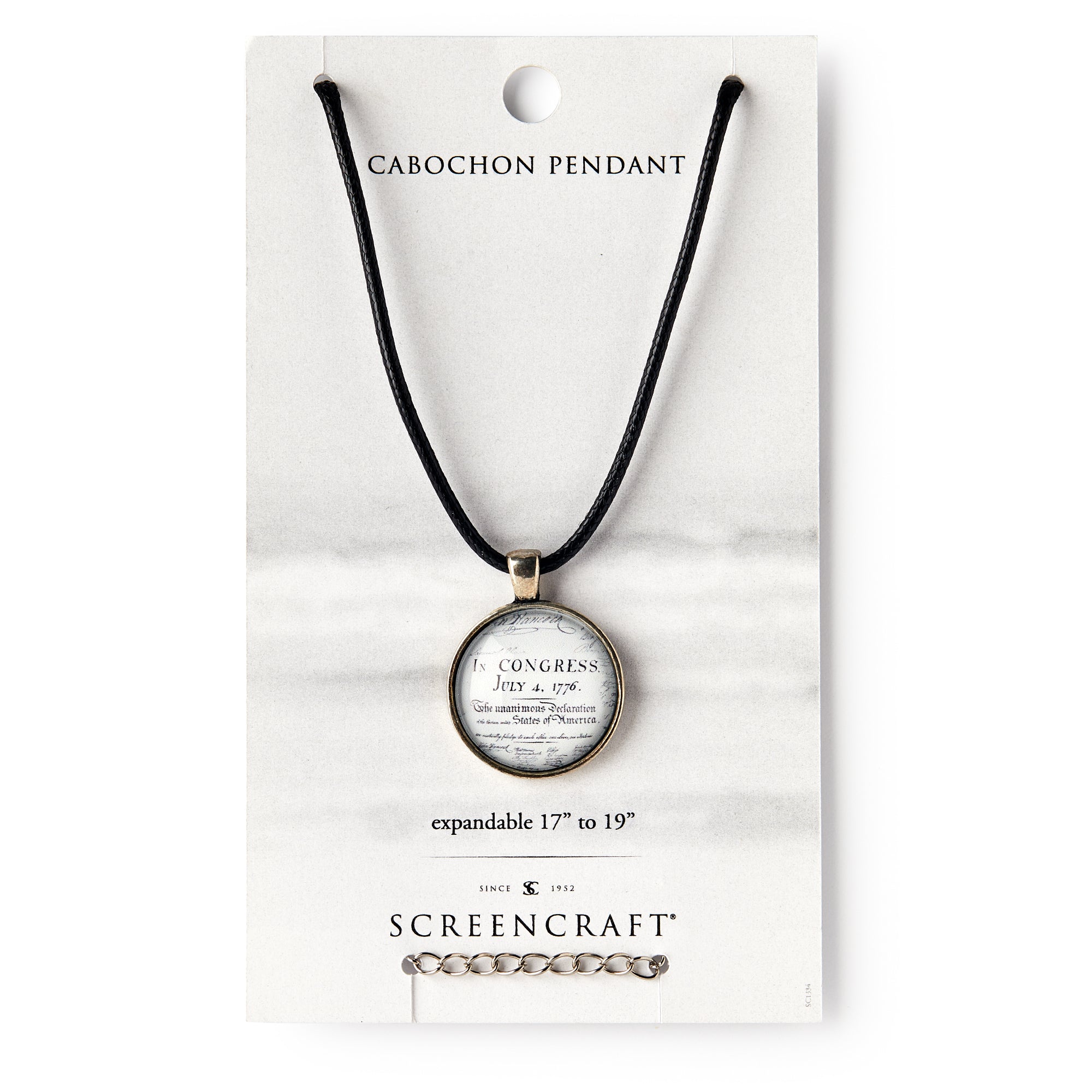 The Declaration Necklace features a round cabochon pendant with historical text on a black cord (17-19” length), shown in Cabochon Pendant and Screencraft packaging. Perfect as a Declaration of Independence necklace.