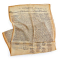 Inspired by the historic “In Congress, July 4, 1776” document, the Declaration Chiffon Scarf features signature script on lightweight fabric.