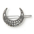 The Half Moon Barrette, Silver, features a crescent shape adorned with rows of sparkling clear rhinestones—an elegant hair accessory that adds dazzling style to any look.