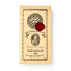 A vintage-style wrapper for Dr. Franklin's Mint Crunch Chocolate Bar features a sun illustration, red wax seal, old portrait, and decorative borders, with dark chocolate details accented by mint oil.