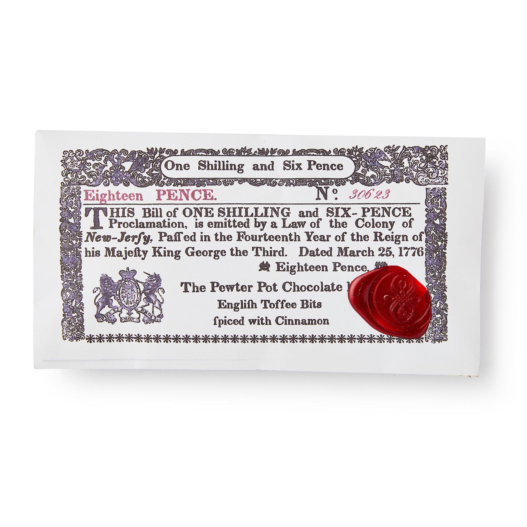 The New Jersey Chocolate Bar features a vintage 18th-century currency-style wrapper with ornate borders, a red wax seal, and highlights its cinnamon-spiced English toffee dark chocolate.