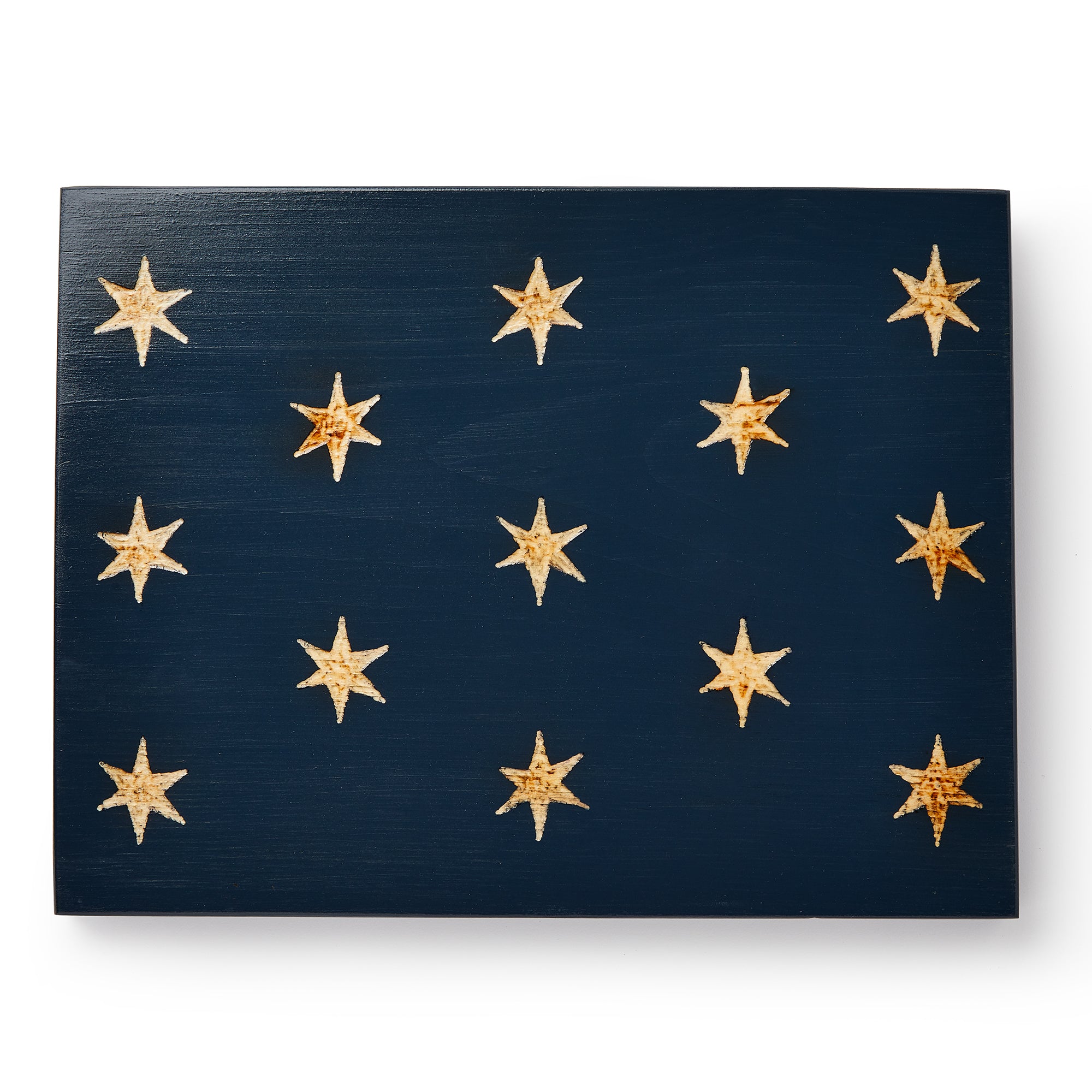 The George Washington Standard Wooden Flag displays a rectangular dark blue surface with thirteen gold stars arranged in uneven rows, inspired by Revolutionary War flag designs.