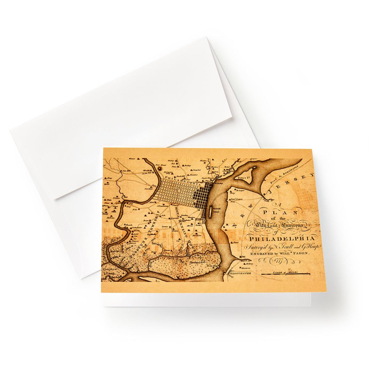 A folded Faden Philadelphia Plan Note Card resting on a white envelope.