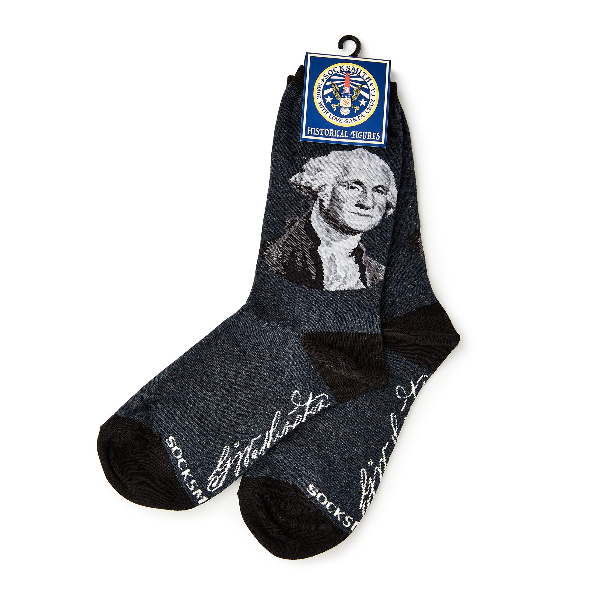 George Washington Socks: Dark socks with his illustrated portrait, signature near the toes, and a Historical Figures tag—a stylish tribute to American history for any fan.