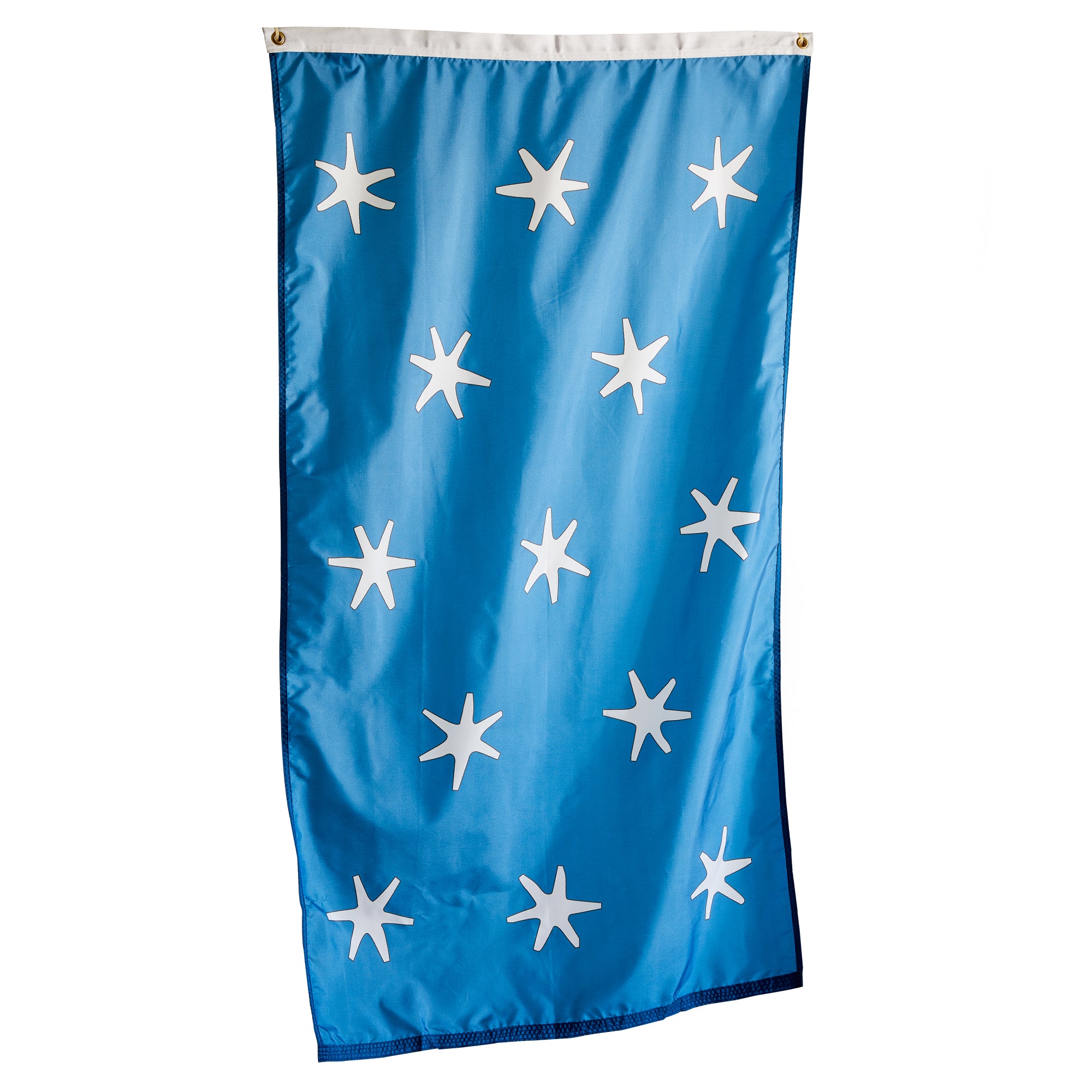 The George Washington Standard Flag, 3'x5', is blue with twelve white, irregular eight-pointed stars in a loose circle. It features a white top strip and two metal grommets for hanging, inspired by historic American flags.