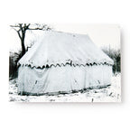 The George Washington Tent In Snow Postcard features a black and white photo of a large canvas tent set up in a snowy landscape, reminiscent of Revolutionary War encampments, with leafless trees and ropes anchoring the tent.