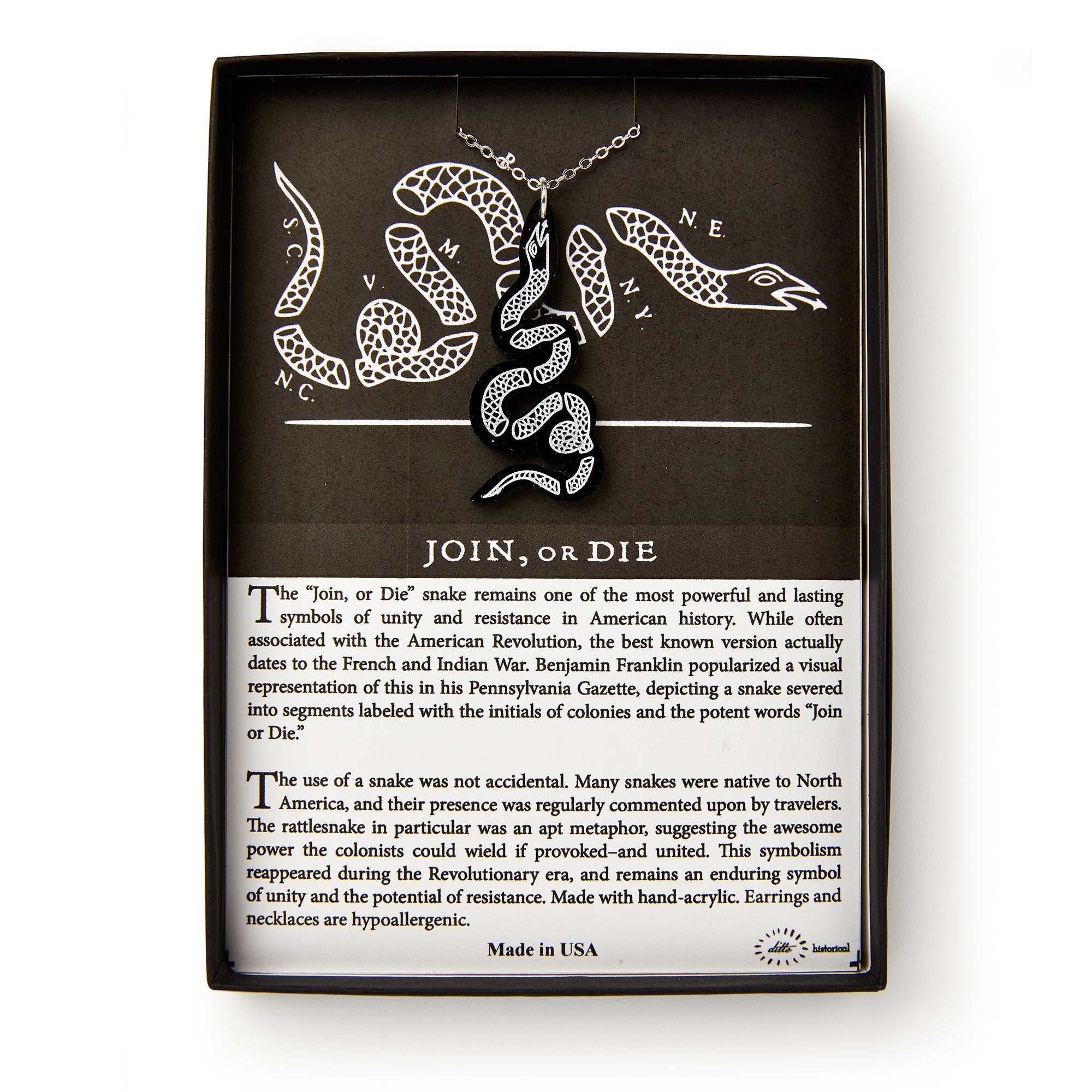 The Black Snake Necklace features a black and white snake pendant on a chain, presented in a box. The background shows the iconic Join or Die snake illustration with text explaining its Revolutionary-era jewelry significance.