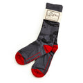 Join or Die Socks feature gray fabric with red toes and heels, plus a black snake inspired by Benjamin Franklin's illustration. Packaged with a tag displaying the iconic slogan and artwork.